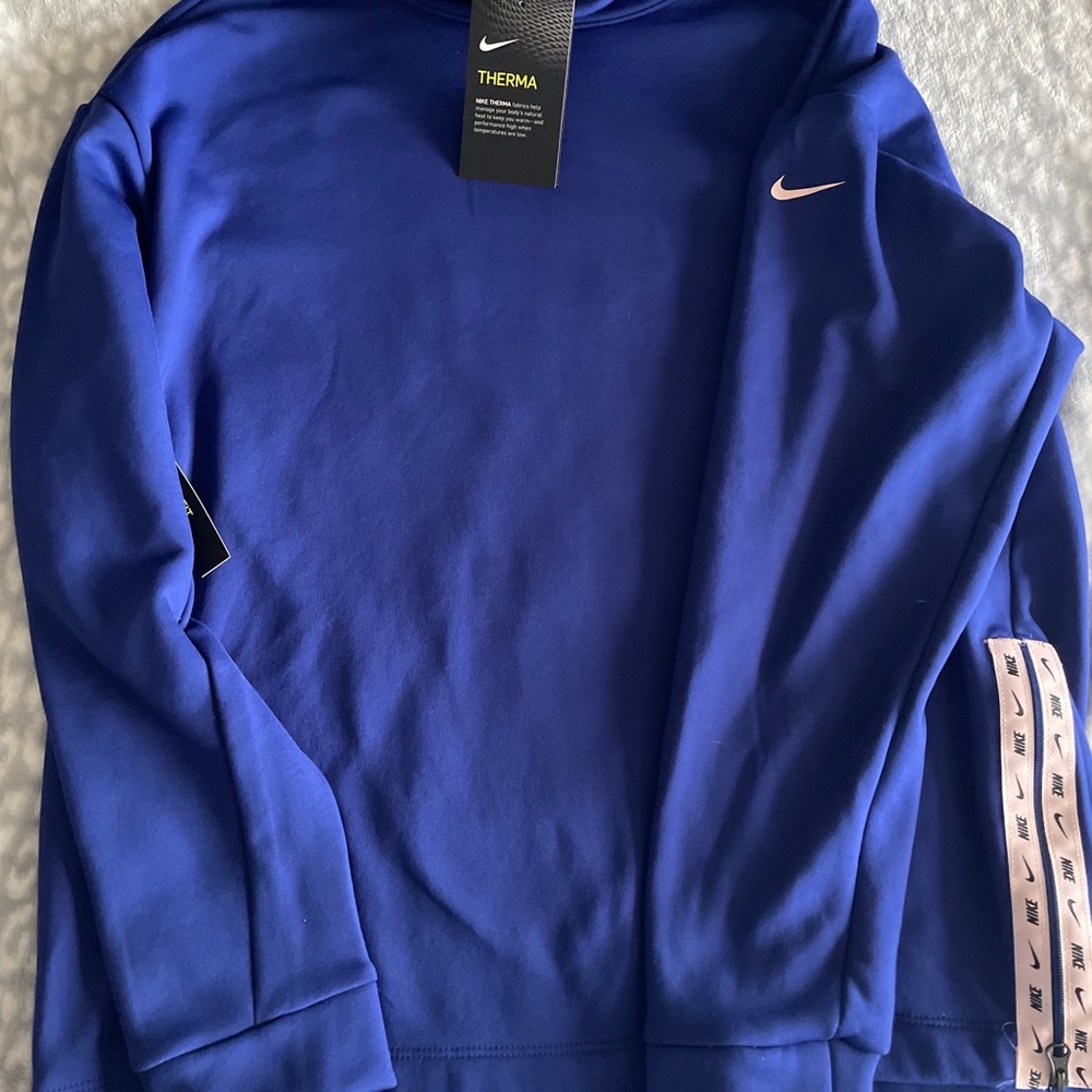small blue and pink loose fit nike thermal sweatshirt with zipper on side